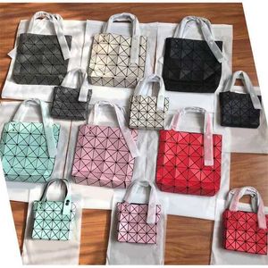 Dames 2024 Japanse originele designer tassen te koop Handtas nieuw vier rooster mini kruislichaam voor dames vierkante ouder-kind doos matte tas draagbaar