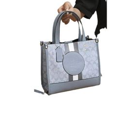 Borsa da donna 2023 Nuova borsa tote di moda di design di nicchia con borsa a tracolla da trasporto stampata di fascia alta m02