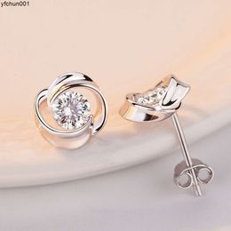 Best verkochte mode-accessoires voor dames Eenvoudige enkele diamant, wit koper verguld, platina 925 zilveren naald roterende hoogwaardige oorbellen