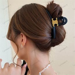 Diseñador de mujer Diadema para damas Pinza de pelo de lujo Marca negra Hebilla de oro clásica Pinzas de pelo de moda Horquillas Garras