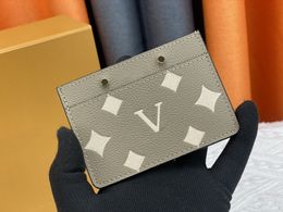 Portefeuilles de créateurs pour femmes Luxurys Empreinte Mini porte-carte classique lettre de fleur sac à main court de haute qualité dames mode petit porte-cartes avec boîte d'origine