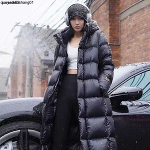 Parkas en duvet pour femmes haut de gamme noir or sept grilles en duvet de canard coupe-vent doudoune pour femmes hiver nouveau mi-long hommes et femmes épais pour les couples