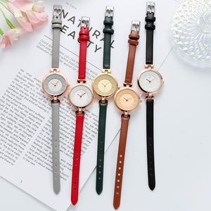 Dames mode casual eenvoudige retro grote wijzerplaat dunne riem waterdichte kwarts horloge q9