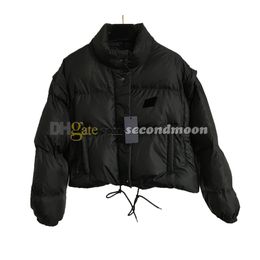 Chaquetas cortas a la moda para mujer, abrigo con insignia de Metal de diseñador, manga desmontable, prendas de vestir exteriores de algodón, chaqueta cálida a prueba de viento para invierno