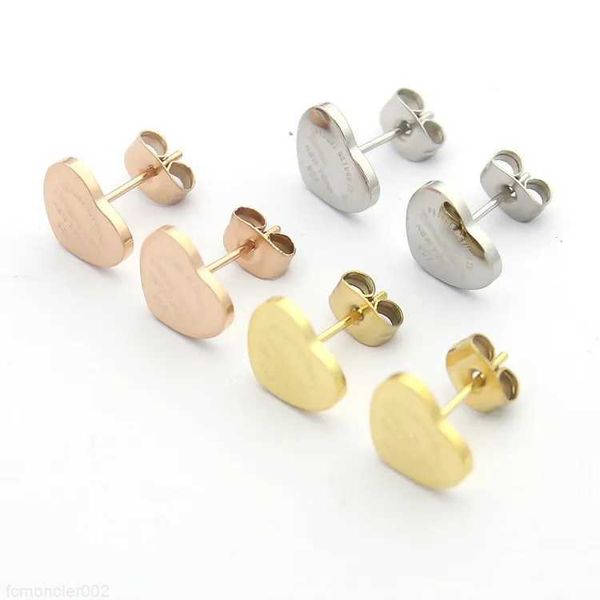 Pendientes en forma de corazón para mujer Studs Diseñador Joyería Simplicidad Color Oro / Plata / Rosa Marca completa como regalo de Navidad de boda IX0M