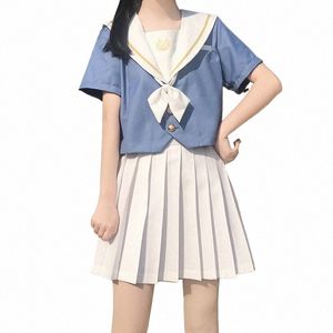 Uniforme scolaire de style japonais pour femmes, nouveau col bleu marine, nœud blanc, manches courtes, bleu, hauts Jk, jupe plissée de couleur unie, costumes T5eq #