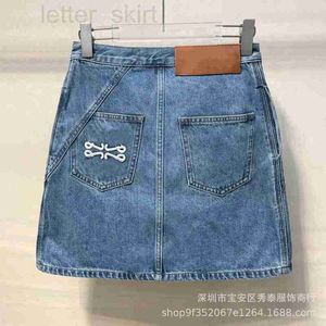 Dames jeans ontwerper hoogwaardige lente/zomer 2023 nieuwe luojia achterzak geborduurd lederen merk schuine zipper denim rok voor dames vtpt