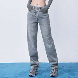 Jeans pour femmes V-waist baril droit de conception de boucle diagonale irrégulière pantalon en denim jean femme