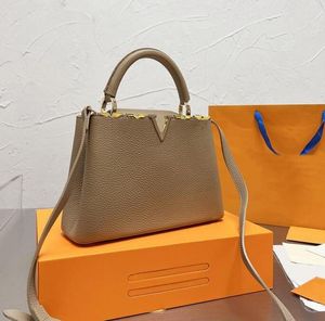 Totes de gran capacidad para mujer Bolso de un solo hombro genuino de alta calidad Marca de diseñador Moda Cuero de vaca Color puro Mujeres Elegancia Temperamento Bolso