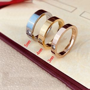 Lettre féminine Love Ring Mens Band Luxury Bands Couple Jewelry Steel Fashion Classic Silver Silver Rose Couleur avec taille 5-11
