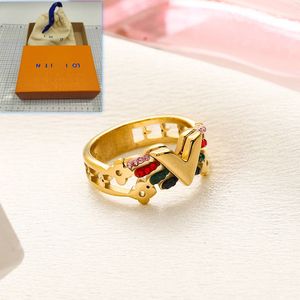 Femmes Amour Bague De Mariage Style De Luxe Plaqué Or Couple Bague En Acier Inoxydable Bijoux De Mode Marque Designer Amour Cadeau Bague Avec Boîte