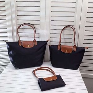 Dames luxe klassieke opvouwbare knoedelbroodje tas waterdichte nylon geborduurde knullingzak mode schoudertas handtas 1As