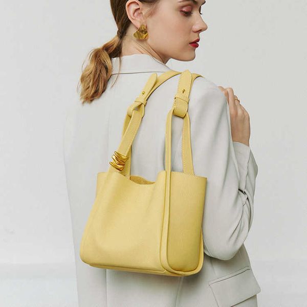 Bolsos de diseñador de lujo para mujer Bolsas de asas de cubo de cuero con textura 2024 Nueva moda de gama alta Bolso de hombro portátil Ventas directas de fábrica