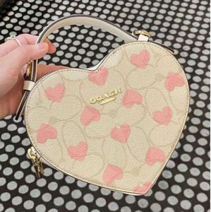 Dames heren zwart witte sacoche hart tas riem lederen portemonnee luxe handtas roze ontwerper schoudertas bovenste handgreep aardbei kruilbody clutch denim stadszakken 5654