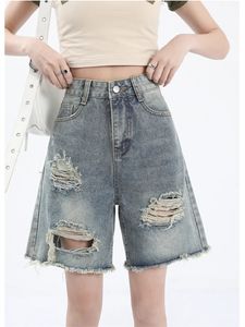 Design de plusieurs trous multiples à jambes larges rétro bleu denim shorts unisexes capris d'été féminin haute taille jeans courte 240409