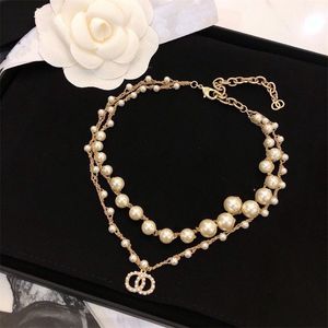 Colliers pour femmes Marque de luxe Bijoux de créateurs Femmes Collier de perles Chaîne de coeur C Chaînes en or Lettre Bijoux pour femmes fête de mariage