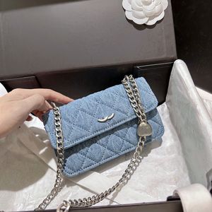 Vrouwen Designer denim ijdelheid tas camellia jean hartcollectie liefde crush silver metaal hardware ketting crossbody schouder handtas mini cosmetische kast zak 15 cm