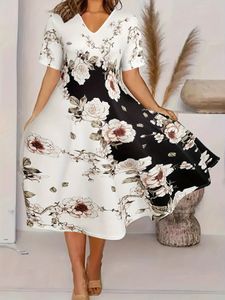 Femme plus taille florale fleurie bohème bœuf lâche robe à manches courtes en V en V printemps d'été printemps imprimé 240417