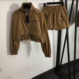 Traje de chándal con capucha para motocicleta de bolsillo para mujer moda otoño primavera manga larga tela impermeable diseñador mujer mujer conjuntos 2 piezas trajes jakets ropa de fábrica