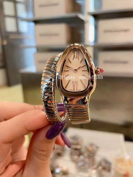 Boîtier de montre à mouvement à quartz pour femme avec bracelet et horloge SERPEN en acier de précision.Une montre personnalisée en forme de serpent avec des montres au design exquis et unique