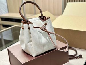 Sac seau rétro pour femme Le sac carré en cuir de parquet en toile luxueux est très petit et peut être utilisé avec un matériau en toile inclinée à la mode et polyvalent.