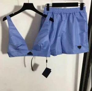 Femmes sexy soutien-gorge survêtements designer mode deux pièces débardeur + shorts ensembles métal col en V soutien-gorge gilet Mini court ensemble Streetwear bleu dos vêtements