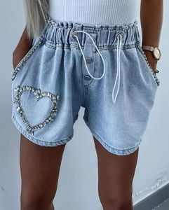 Pantalones cortos para mujeres y2k temperamento de moda casual de verano desplazamiento del patrón de corazón del corazón Denim Ottd 230601