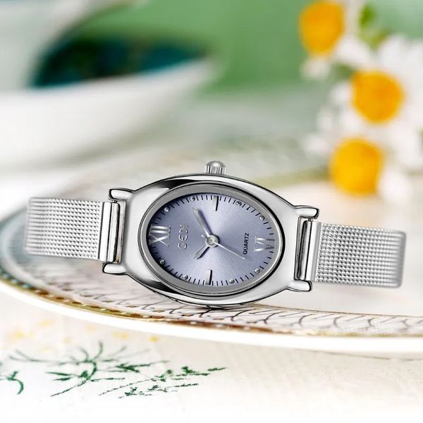WOMEN Luz simple de lujo de alto grado acero inoxidable ovalado compacto exquisito impermeable regalos de reloj de cuarzo