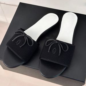 Dames slippers slippen op sandalen ontwerper lage hak met bowknot glijbanen 24ss summer mules klassieke rode perzik zwart baby blauw casual schoen buiten strandmeisjes vrije tijd schoen