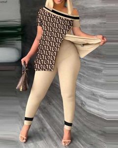 Pantalons de femmes en deux pièces Femmes Summer Géométrique Top Split Hem Top 2023 Femme à manches courtes Suisses décontractées