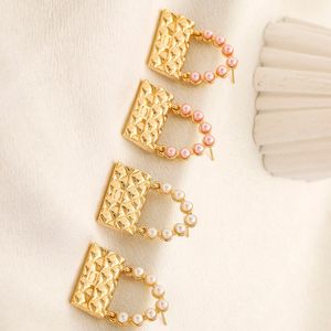 Dames bruiloft sieraden ontwerper oorbellen oorstop goud vergulde ontwerpers koper oorbel modemerk brief imitatie parel prachtige festivals cadeau