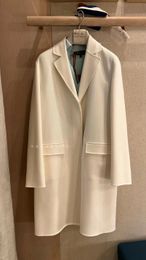 Dameswollen winter loro piana witte revers lange wollen jas