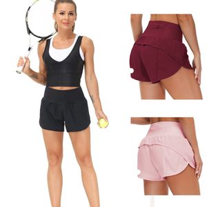 Shorts de yoga pour femmes tenues avec exercice de fitness usure pantalon court girls exécutant des poches de sport élastiques