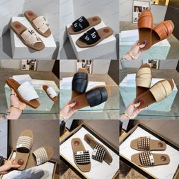 Sandales boisées pour femmes lettrage des femmes Choel Tabillons toile plates Mules de luxe Luxury Platforms d'été Platphescules