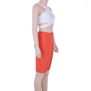 Robes de travail 2 pièces ensemble tricoté 2023 Sexy femmes blanc trou de serrure croix haut court Orange moulante jupe