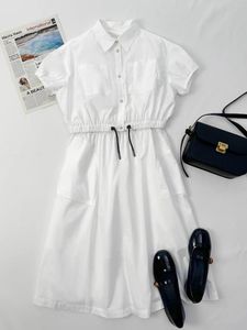 Vestidos de trabajo 2024 Camisa blanca de moda europea y americana Falda elegante Vestido casual elegante Conjunto de dos piezas para mujeres