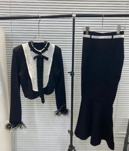 Robes de travail 2024 Spring Luxury Fashion Femmes Plume Tricoted Bow Pull Joard avec des costumes de jupe MIDI pour FEMME DDXGZ2 2.19
