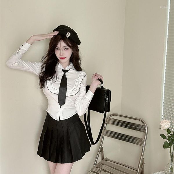 Vestidos de trabajo Traje de estilo universitario de otoño e invierno Corbata de manga larga coreana Camisa blanca con volantes Falda plisada negra JK Conjunto de dos piezas de moda