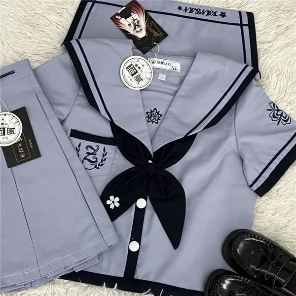 Vestidos de trabajo Original Escuela Japonesa Chica JK Faldas de uniforme Conjunto Mujeres Bow Sailor Blusas Falda corta plisada Traje Trajes de la Marina