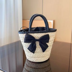 Bolso tejido bolso bolso de paja diseñador canasta de vegetales de arco grande moda hueco saltadora gran bolso de balde para mujeres bolsas de compras grandes capacidad de compra