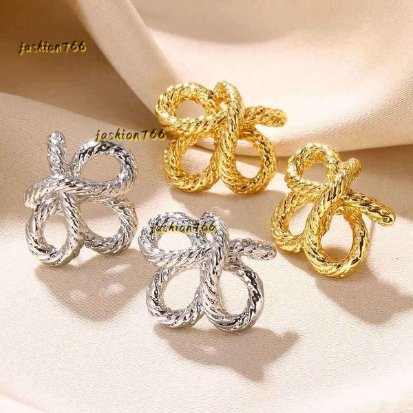 Boucles d'oreilles à fleurs tissées pour femmes, torsadées, nœud en acier inoxydable, tendance, Piercing esthétique, nouveaux bijoux 2024