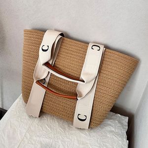 Bolso de mano tejido Bolso de playa de diseñador Bolso de paja de verano Bolso bandolera informal para compras Bolso de gran capacidad Bolsos de viaje de fin de semana Totes de color tejido de hierba Lafite al por mayor