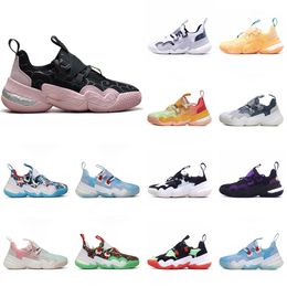 Refuerzo envuelto Trae Young Basketball 1.0 Zapatos retorno zapato choque antiguos absorción resistente al desgaste antideslizante CNY algodón de azúcar trae azul negro polvo graffiti Navidad