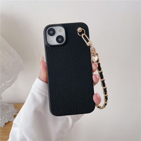 Pulsera Pulsera Lychee Pattern Vogue Phone Case para iPhone 14 13 12 11 Pro Max Durable Love Heart Pendant Color sólido Funda trasera de cuero a prueba de golpes