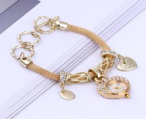 Montre-bracelets Diamond Watch Peach Heart Bracelet Dames Mesh Band Pendant Love Retro Strap en acier inoxydable Retro9575426