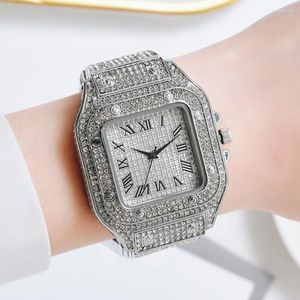 Montres-bracelets de luxe Moissanite glacé montres Hip Hop buste vers le bas unisexe diamant montre en acier inoxydable poignet clouté