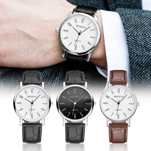 Montre-bracelets Mens 2024 Men de poignet classique Vintage Design Es Leather Strap Quartz Analog pour homme cadeau Reloj Hombre H240504