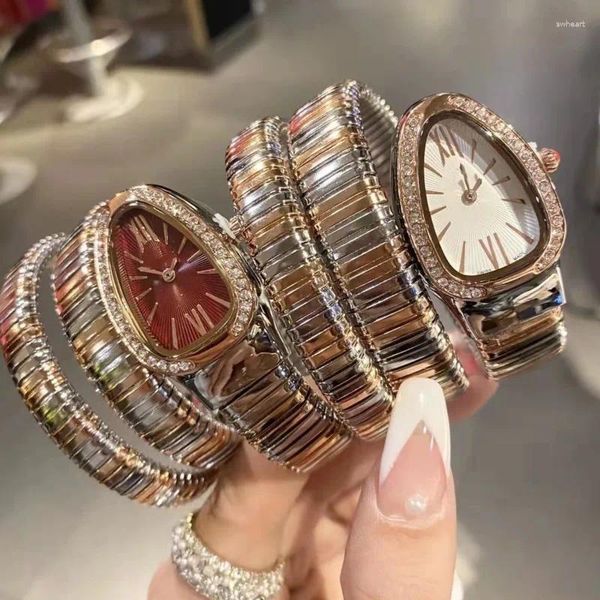 Relojes de pulsera con forma de serpiente, relojes de cuarzo ligeros de nicho de lujo para mujer, banda de acero, reloj de gama alta simple y de moda para mujer