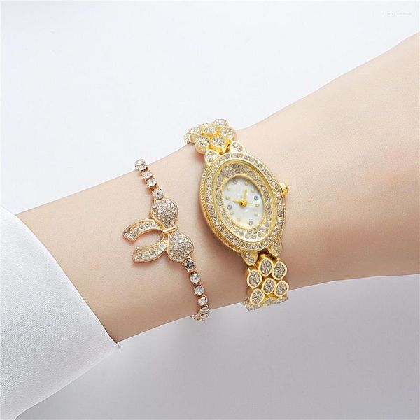 Relojes de pulsera de moda para mujer, reloj con correa de acero, esfera ovalada, juego de diamantes, pulsera de lujo de cuarzo de aleación fina para mujer