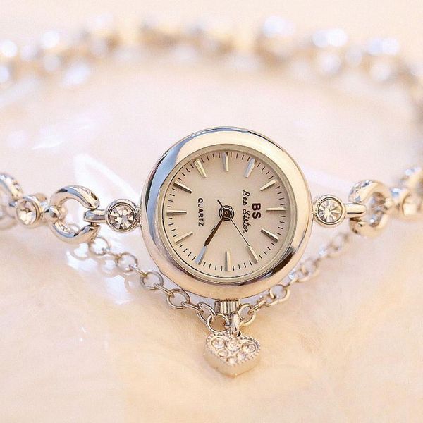 Muñecos de pulsera Relojes Diamond Watch Corea El pequeño reloj de brazalete Femenino Rose Rose Vestido de novia Correa de acero Muñeco